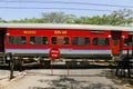 Kochi, Kerala, India -March 5, 2021 a train moving with electric support through the indian railway clossed level cross Royalty Free Stock Photo