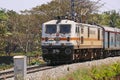 Kochi, Kerala, India -March 5, 2021 a train moving with electric support through the indian railway track Royalty Free Stock Photo