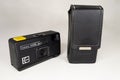 KODAK pocket camera A-1. Black analog camera with yellow trigger. White background Royalty Free Stock Photo
