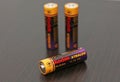 Kodak Xtralife AA R6 Alkaline batteries on dark background