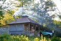 KODORI GORGE, ABKHAZIA - JUNE 18, 2017: Old Russian car, GAZ-69 and hunters house