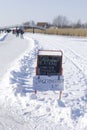 `Koek en Sopie` blackboard in the snow