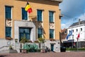 Koekelberg, Brussels Capital Region, Belgium - Facade of the town hall with a Belgian flag