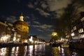 Koepelkerk next to Singel canal in Amsterdam at night Royalty Free Stock Photo