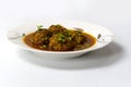 Kofta Curry, Delicious Meat Balls in thick spicy gravy in plate on white background Royalty Free Stock Photo