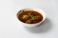 Kofta Curry, Delicious Meat Balls in thick spicy gravy in bowl on white background Royalty Free Stock Photo