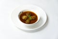 Kofta Curry, Delicious Meat Balls in thick spicy gravy in bowl on white background Royalty Free Stock Photo