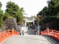 Red bridge crossing the moat at the entrance to Takeda Shrine on the grounds Royalty Free Stock Photo