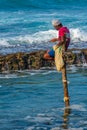 Koggala, Sri Lanka, January 22, 2022: Traditional stilt fisherme