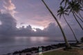 Silhouettes of the traditional Sri Lankan stilt fishermen on a stormy in Koggala, Sri Lanka. Stilt fishing is a method of fishing