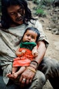 kogi tribal kid doing laundry in the nearby stream close to their home