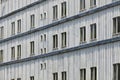 Facade of an abandoned and rusted multi-story hotel ship at Grand Lagoona