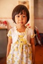 Portrait of a Khmer little girl in vintage dress, cute black eyes looking at camera