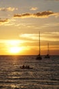 Koh kood beach thailand, sunset boat orange sky people on boat, kayaking silhouette Royalty Free Stock Photo