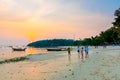 Koh Lipe, Thailand - 13.11.2019: Tourists are taking selfie photos during sunset at Ko Lipe island, Thailand. Beautiful and Royalty Free Stock Photo