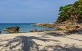 White sand nudist beach, palm tree shadow Royalty Free Stock Photo