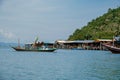 Koh Phitak , Chumphon province Thailand January 2020, fishing boats and small huts above the water, Koh Phitak a