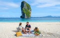 Koh Poda Krabi Thailand, an Asian woman and a European man on a beach in Thailand