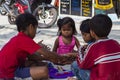 Koh Rong island, Cambodia - April 7, 2018: Khmer children on village street. Playing kids with emotional faces. Royalty Free Stock Photo