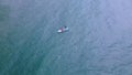 Koh Samed Island, Thailand. two people playing stand up paddle board SUP in sea water near beach. tourist comeback from quaranti