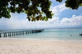 Koh Samed Island view, beautiful natural scene of tropical summer sand beach with blue sea and cloudy blue, wooden bridge leading Royalty Free Stock Photo