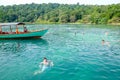 People maiking snorkeling at Koh Ta Kiev island on Cambodia