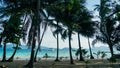 Tropical white sand beach with coco palms and the turquoise sea at Koh Wai Island, Thailand Royalty Free Stock Photo