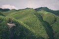 KOHIMA, INDIA - Jul 29, 2019: A Canadian Women Meditating in the Dzukou valley of Nagaland