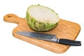 Kohlrabi lies on a wooden board next to a knife, 3D rendering