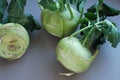 Kohlrabies cabbage turnips raw on neutral background. Royalty Free Stock Photo