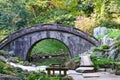 Arched Stone Bridge at Koishikawa Korakuen Garden, Tokyo Royalty Free Stock Photo