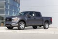 Ford F-150 display at a dealership. The Ford F150 is available in XL, XLT, Lariat, King Ranch, Platinum, and Limited models Royalty Free Stock Photo