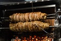 Kokorech lamb intestines roasting in Turkish market. Traditional street food.