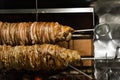 Kokorech lamb intestines roasting in Turkish market. Traditional street food.