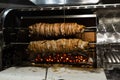 Kokorech lamb intestines roasting in Turkish market. Traditional street food.