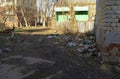 Kokshetau - Kazakhstan - April 15, 2021: Big pile of trash or garbage in residencial district next ro the buildings