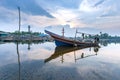 Kolae fishing boats dock on the Bang Nara River at dusk Royalty Free Stock Photo