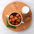Kolak Biji Salak or Sweet Potato Porridge in White Bowl in White Background, Made from Sweet Potato, Sago Flour, Brown Sugar and