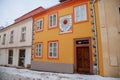 Kolin, Czech Republic, 17 December 2022: Narrow picturesque street with colorful renaissance baroque historical houses in medieval