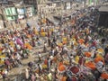 Panoramic street view of the busy flower market in the city of Kolkata, India