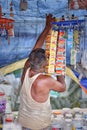 Kolkata, India-July 27,2019: Shopkeeper selling goods at Patuli Floating Market, Kolkata, India