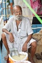 Kolkata, India-July 27,2019: Shopkeeper selling goods at Patuli Floating Market, Kolkata, India