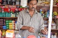 Kolkata, India-July 27,2019: Shopkeeper selling goods at Patuli Floating Market, Kolkata, India