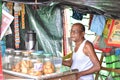 Kolkata, India-July 27,2019: Shopkeeper selling goods at Patuli Floating Market, Kolkata, India