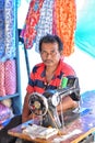 Kolkata, India-July 27,2019: Tailor selling cloths at Patuli Floating Market, Kolkata, India