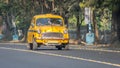 Iconic yellow Indian taxi in Calcutta Kolkata, West Bengal, India