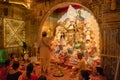 Priest worshipping Goddess Durga, Durga aarti - Hindu ritual