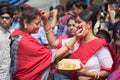 Kolkata, India Ã¢â¬â 8th October 2019; Women participate in Sindur Khela at a puja pandal on the last day of Durga puja at Baghbazar