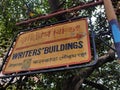 Old metallic street sign board placed on the pole outside the haunted Writers building in Calcutta.