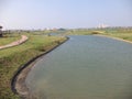 Kolkata, West Bengal/India - February 18, 2014: Cropped view of decorated man made water body inside public park at `Eco Park` Raj